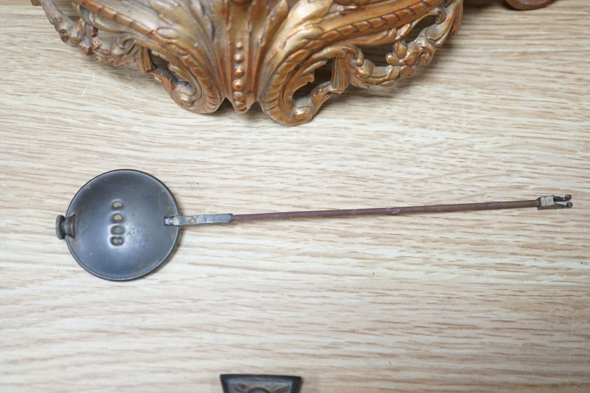 A 19th century French gilt spelter and Alabaster mantel clock, with pendulum, 36cms high.